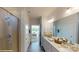 Spa-like bathroom featuring a walk-in shower and double vanity at 8020 Plymouth Dr, Sherrills Ford, NC 28673