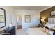 Well-lit bedroom with double doors and a large mirror at 8020 Plymouth Dr, Sherrills Ford, NC 28673