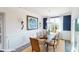 Bright dining room with a wooden table and chairs, and a view to backyard at 8020 Plymouth Dr, Sherrills Ford, NC 28673