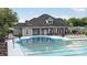 Community pool with clubhouse and surrounding lounge chairs at 8020 Plymouth Dr, Sherrills Ford, NC 28673