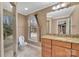 Bathroom with granite vanity and walk-in shower at 8031 Nathanael Greene Ln, Charlotte, NC 28227