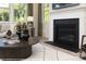 Living room fireplace with dark stone surround at 9957 Cask Way, Huntersville, NC 28078