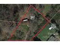 Aerial view showing a house and surrounding land at 114 Cedar Ridge Loop, Statesville, NC 28625