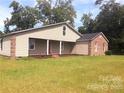 Ranch house with brick and siding exterior at 310 East St, Heath Springs, SC 29058