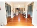 Grand entryway with hardwood floors and staircase at 318 Camden Rd, Wadesboro, NC 28170