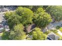 Aerial view showing house location and surrounding trees at 2607 N Main St, Kannapolis, NC 28081