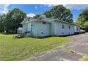 Side view of a blue church building with a small parking lot at 3391 Briarwood Dr, Maiden, NC 28650