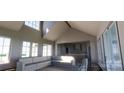 Spacious living room with vaulted ceilings and kitchen view at 2306 Bridgewater Rd # 3, Rock Hill, SC 29730