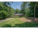Brick house with columns and well-maintained lawn at 620 N 9Th St # 5/6, Albemarle, NC 28001