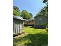Spacious backyard with shed and deck at 620 Central Ave, Albemarle, NC 28001