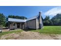 House exterior needing some repairs at 1672 Riverview Rd, Lincolnton, NC 28092