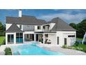 Luxury home with a large pool, patio, hot tub and outdoor kitchen area at 8014 Litaker Manor Ct, Charlotte, NC 28270