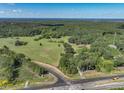 Aerial view of property showing road access and pond at 44333 Stony Gap Rd, Albemarle, NC 28001