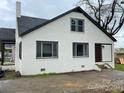 Charming white brick ranch home with dark brown accents and a spacious yard at 108 Lee Dr, Shelby, NC 28150