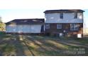 Back exterior of home with brick and siding at 818 Hwy 742 S Hwy, Wadesboro, NC 28170