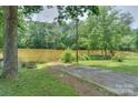 Concrete boat ramp leading to a calm lake at 4115 Cascade St, Terrell, NC 28682