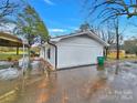 Side view of a newly renovated ranch home at 533 Amon Ln, Pineville, NC 28134
