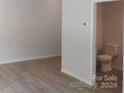Simple bathroom with toilet and vinyl flooring at 4229 S New Hope Rd # 11, Cramerton, NC 28032