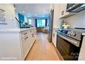 Sleek kitchen with stainless steel appliances and white cabinetry at 1017 North End Dr # 27, Charlotte, NC 28206