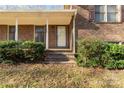 Brick house with a covered porch and steps leading to the entrance at 1836 Westbrook Rd, Edgemoor, SC 29712