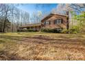 Brick ranch house with covered porch and large yard at 1836 Westbrook Rd, Edgemoor, SC 29712