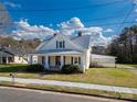 Farmhouse with a street view and spacious yard at 206 E Allenton St, Mount Gilead, NC 27306