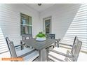 Small patio with table and chairs at 1205 Red River Dr, Salisbury, NC 28144