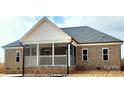 A large screened porch with white railings at 00 Wilson Ct # 11, Lincolnton, NC 28092