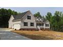 House exterior showcasing a gray color scheme and a long driveway at 2223 Cedar Rd # 2, York, SC 29745