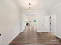 Bright foyer with hardwood floors and view to living area at 1005 Piper Meadows Dr # 1, Waxhaw, NC 28173