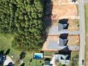 Aerial view showing a new home, lot, and pool at 9605 Hwy 52 N None # 4, Wadesboro, NC 28170