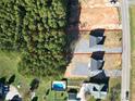 Aerial view of two houses and a pool on a large lot at 9617 Hwy 52 N None # 3, Wadesboro, NC 28170
