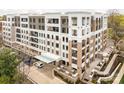 Luxury multi-unit building with a modern design and landscaping at 130 Cherokee Rd # 102, Charlotte, NC 28207