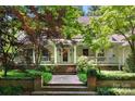 House exterior with large porch and landscaping at 205 Vauxhall Dr, Shelby, NC 28150
