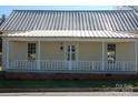 House with metal roof and porch at 710 Austin St # 124, Albemarle, NC 28001