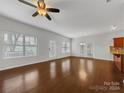 Spacious living area with hardwood floors and access to a patio at 24589 Blue Heron Cir, Lancaster, SC 29720