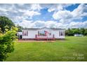 Front view of the house with a yard at 707 Cool Spring Rd, Statesville, NC 28625