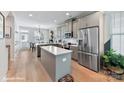 Modern kitchen with gray cabinets and quartz countertops at 512 Lockwood Creek Dr # 29, Charlotte, NC 28208