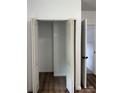 Bright bedroom with double door closet and hardwood floors at 115 Palmer St, Shelby, NC 28150