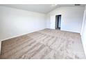 Spacious bedroom with vaulted ceiling and carpet at 414 Apex Cir, Shelby, NC 28152