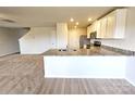 Modern kitchen with granite countertops and white cabinets at 414 Apex Cir, Shelby, NC 28152