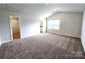 Large bedroom with vaulted ceiling and walk-in closet at 414 Apex Cir, Shelby, NC 28152