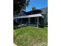 House exterior with gray siding and a covered porch at 602 S Carolina St # 11, Spencer, NC 28159