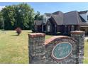 Brick home in Anson Brook with a stone entrance at 115 Anson Dr, China Grove, NC 28023