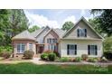 Brick and vinyl sided home with manicured landscaping at 3617 Venetian Way, York, SC 29745