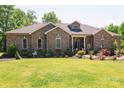 Brick home with large front yard and mature trees at 4642 King Crowder Dr, Gastonia, NC 28052