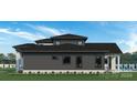 Side view of house showcasing dark siding, white accents, and a pool in the backyard at 628 Wisteria Vines Trl # 6, Fort Mill, SC 29708