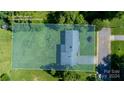 Aerial view showing house, yard, and lot lines at 925 Henkel Rd, Statesville, NC 28677