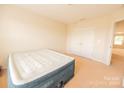 Bedroom with double doors and carpeted floor at 3040 Gilroy Dr, Indian Land, SC 29707