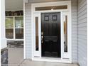 Modern black front door with sidelights and a gray exterior at 1465 Ardmore Dr # 237, Sherrills Ford, NC 28673